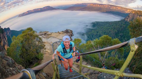 climb athlete group destination smiles stairs2